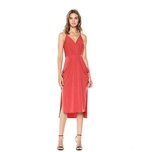 NWT - BCBGeneration halter dress in color “cinnabar” similar to a burnt orange